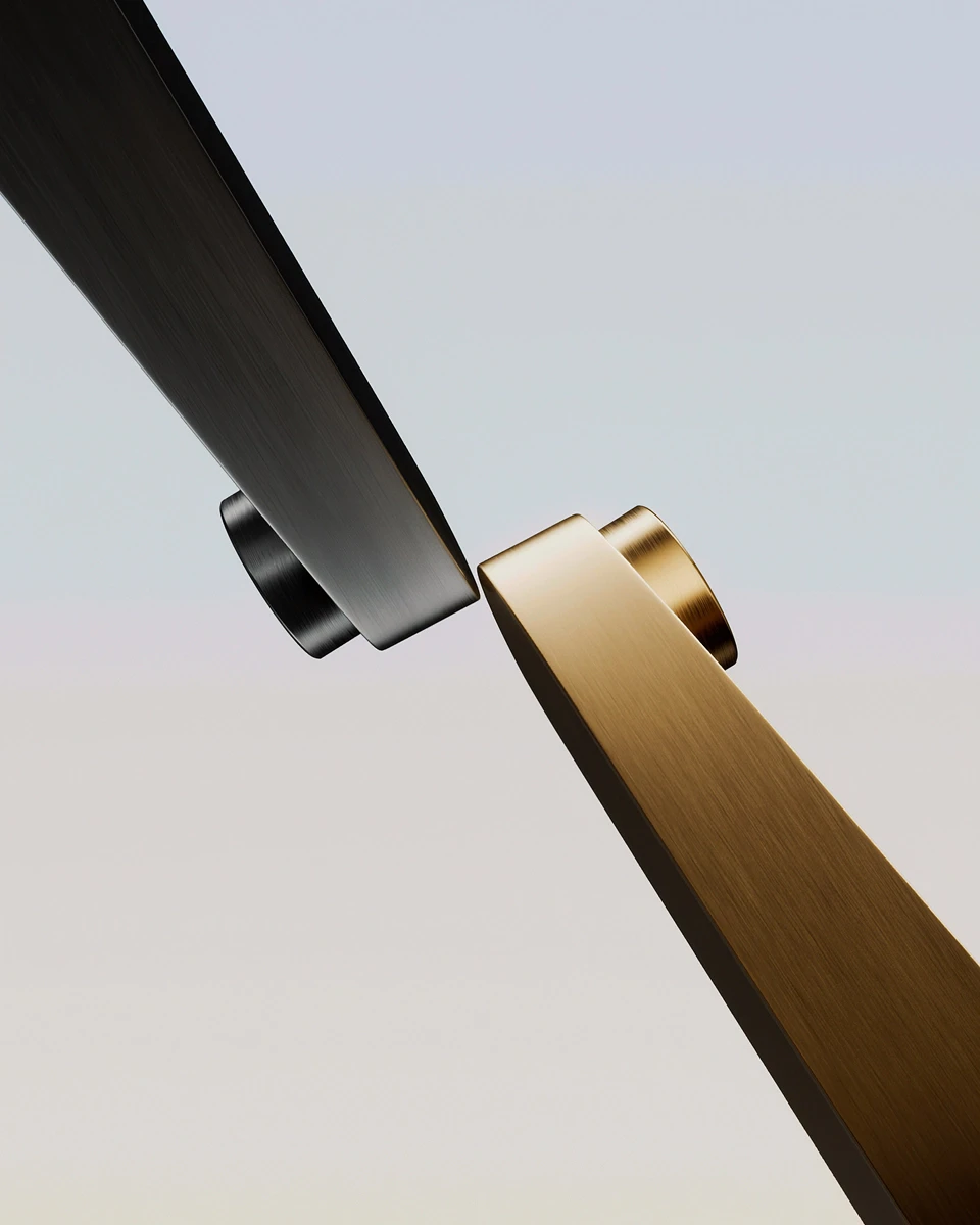 CONTOUR mixer handles in anthracite and gold finishes