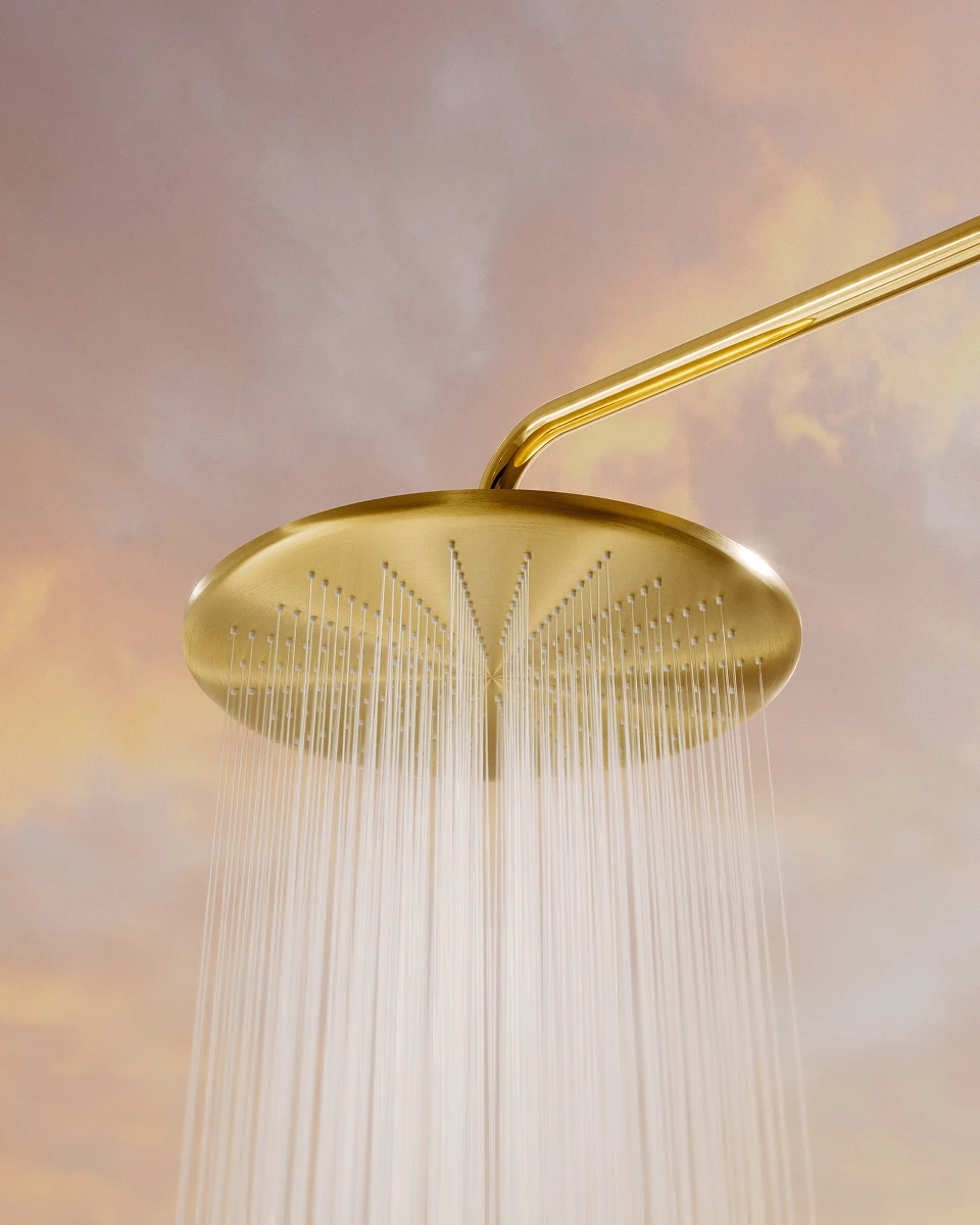 Gold BEYOND overhead shower against the sky