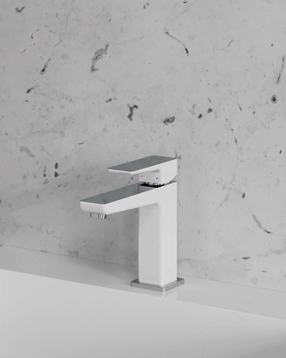 PARMA basin mixer in chrome and white against white marble