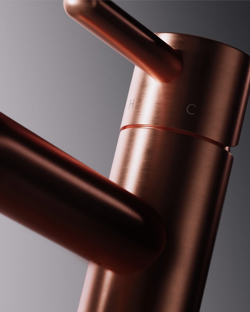 Detail of a Y collection mixer in a copper finish